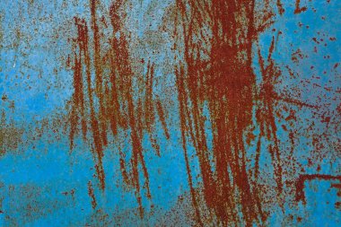 Kırmızı ve mavi metalik paslı yüzeyi dokulu bir arka plan olarak