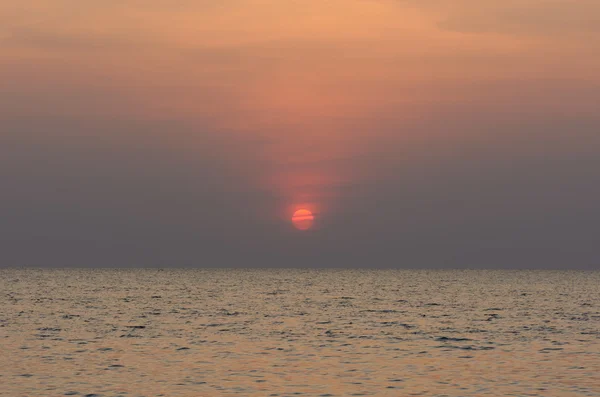 Lucht van zee en de zonsondergang Stockfoto