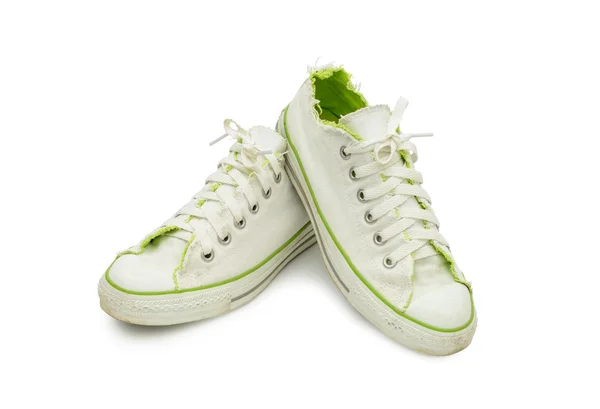 Witte en groene canvas schoenen Stockfoto