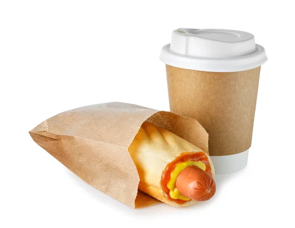 Odnášecí šálek kávy a hot dogu — Stock fotografie