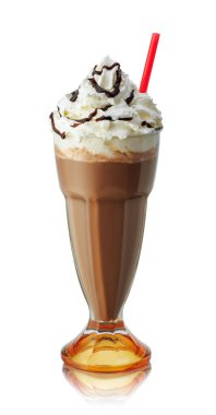 chocolate milkshake in glass with whipped cream and brown syrup isolated on white background