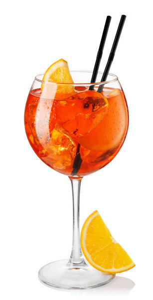 Cold aperol spritz cocktail in glass with straw and slice of orange isolated on white background. File contains clipping path