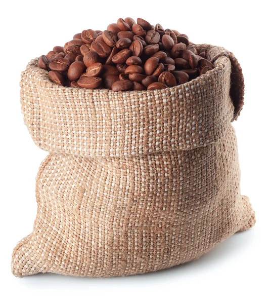 Kaffebönor i säckväv — Stockfoto