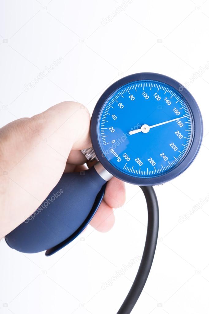 Holding in hand sphygmomanometer isolated on white background