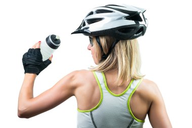 Bisikletçi bir enerji spor içme plastik şişe içki. Sporda kazanma kavramı. Beyaz arka plan üzerinde izole