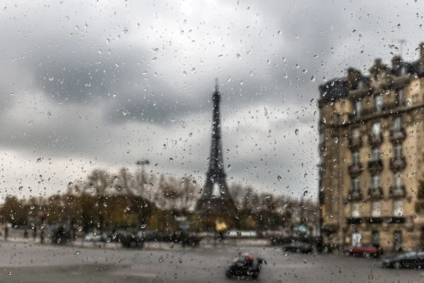 Abstract blurry background with water drops: view through the window Paris France — Stock Photo, Image