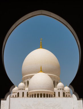ABU DHABI, UAE - MAY 13, 2014: Sheikh Zayed Mosque in Abu Dhabi, considered to be the key for worship in the United Arab Emirates