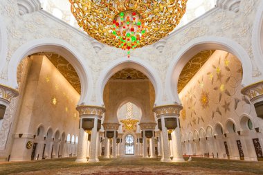 ABU DHABI, UAE - MAY 13, 2014: Sheikh Zayed Mosque in Abu Dhabi, considered to be the key for worship in the United Arab Emirates