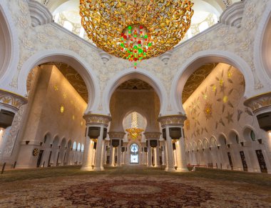 ABU DHABI, UAE - MAY 13, 2014: Sheikh Zayed Mosque in Abu Dhabi, considered to be the key for worship in the United Arab Emirates