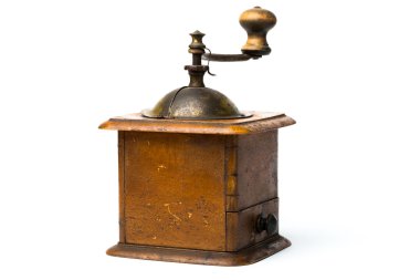 Antika el-değirmen bir taşlama için baharat ve üzerinde kahve izole 