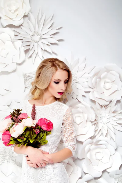 Young gorgeous woman, bride, blond long curly hair, studio decor — Stock Photo, Image