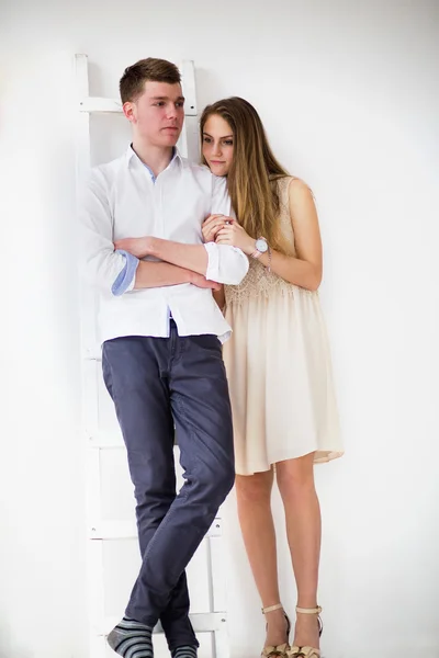 Happy young couple standing together — Stock Photo, Image