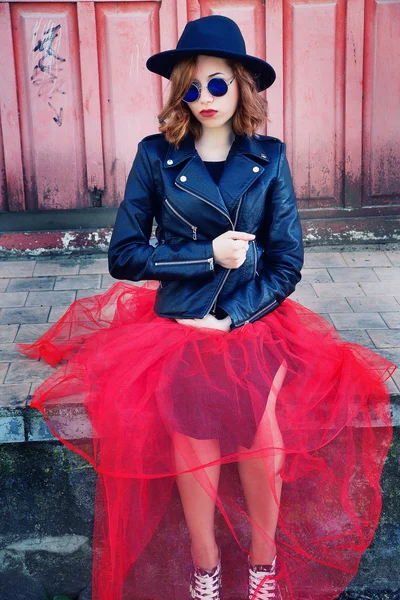 Stylish girl in black leather jacket and long skirt — Stock Photo, Image