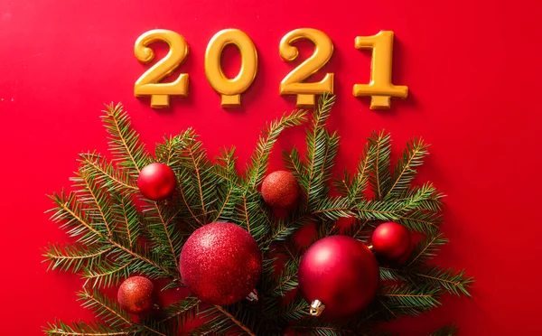Numbers 2021 Christmas Tree Branch Red Toy Ballson Red Background — Stock Photo, Image