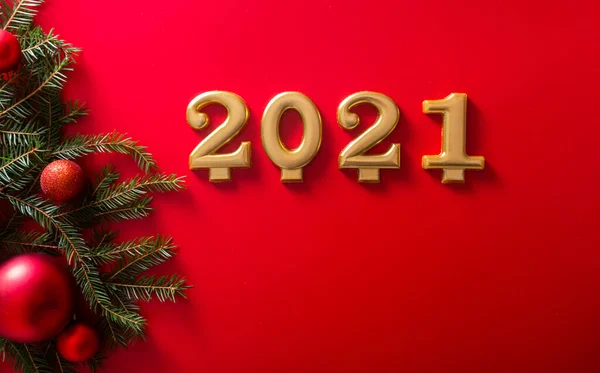 Numbers 2021 Christmas Tree Branch Red Toy Ballson Red Background — Stock Photo, Image