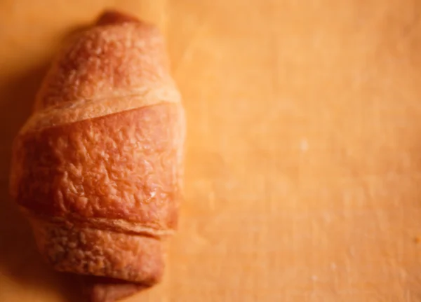 Croissanty na žlutý ubrus — Stock fotografie