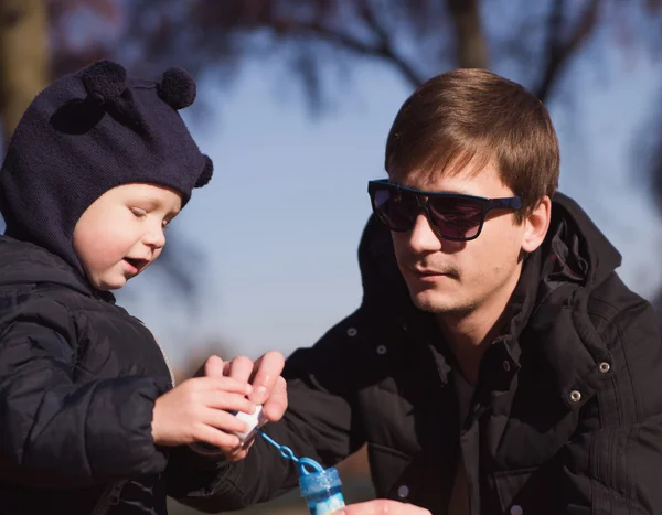 Father and son having a good time outdoor — Stock Photo, Image