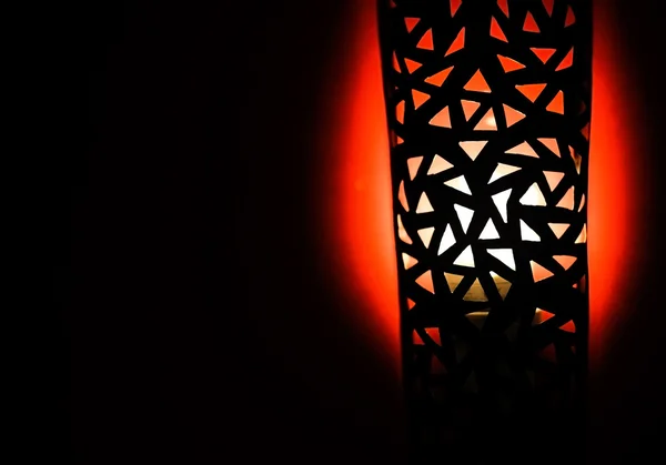 Eine moderne Lampe an einer Wand — Stockfoto