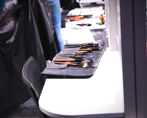 makeup brushes on the table