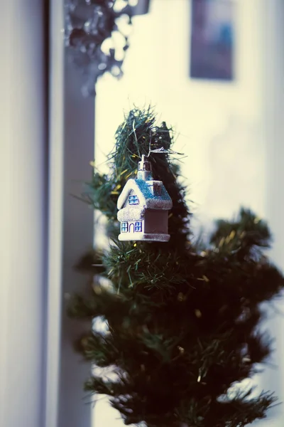 Toy on the Christmas tree - the little house — Stock Photo, Image