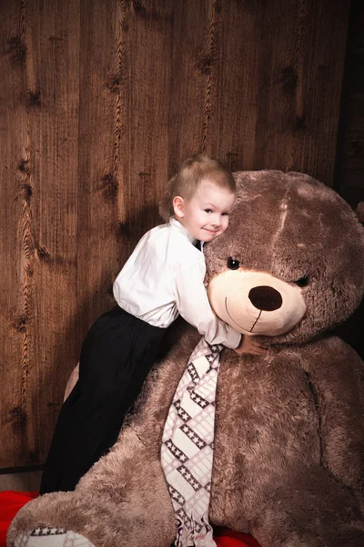 Little cute boy in white shirt  with big smileTeddy bear — Stock Photo, Image