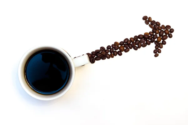 Pfeil aus Kaffeebohnen mit Tasse — Stockfoto