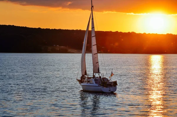 Small Sailing Ship Sailing Calm Sea Sunset Stock Photo