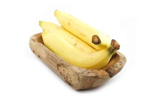 Banana na placa de madeira Isolado, fundo branco — Fotografia de Stock