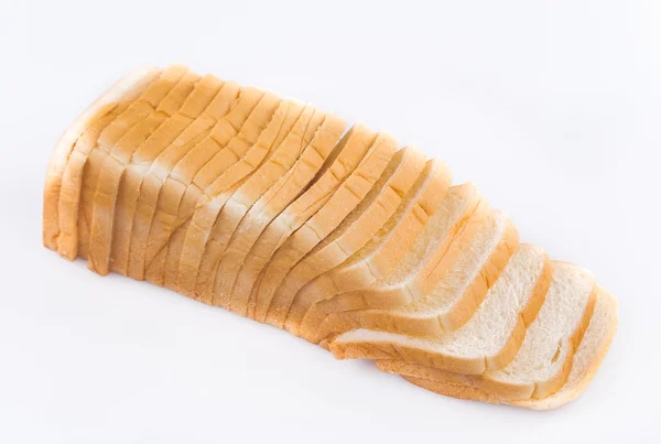 흰 배경에 분리 된 얇게 썬 빵 — 스톡 사진
