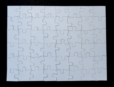 Completed White Jigsaw Puzzle on Black Background clipart