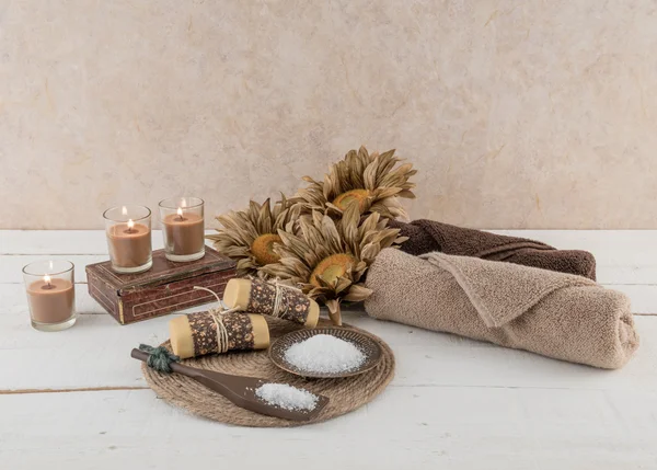 Spa and Bath Essentials in Rustic Candlelit — стоковое фото