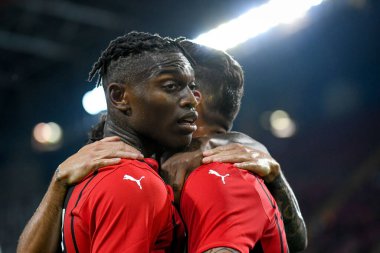Rafael Leao (Milan), Olivier Giroud 'un (Milan) 14 Ağustos 2021' de İtalya 'nın Trieste kentindeki Nereo Rocco Stadyumu' nda oynanan dostluk maçı AC Milan-Panathinaikos FC maçında gol attı.