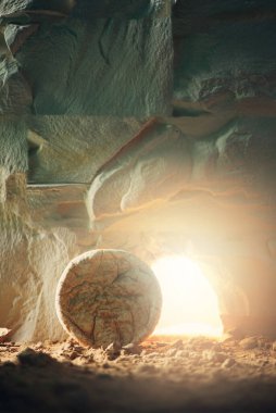 Stone is rolled away from empty grave on Easter morning. Jesus Christ resurrection. Empty tomb of Jesus with light. Born to Die, Born to Rise. He is not here he is risen . Christian Easter concept clipart