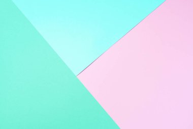Moda yeşili ve pembe renkli arka plan. Modaya uygun bir kağıt. Üst Manzara. Minimum konsept. Modaya uygun nane rengi