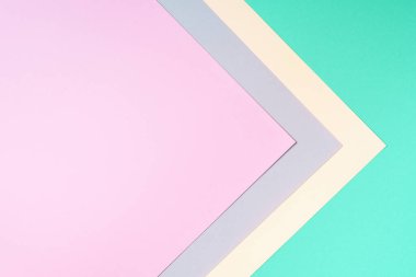 Moda yeşili ve pembe renkli arka plan. Modaya uygun bir kağıt. Üst Manzara. Minimum konsept. Modaya uygun nane rengi