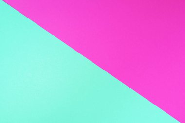 Moda yeşili ve pembe renkli arka plan. Modaya uygun bir kağıt. Üst Manzara. Minimum konsept. Modaya uygun nane rengi