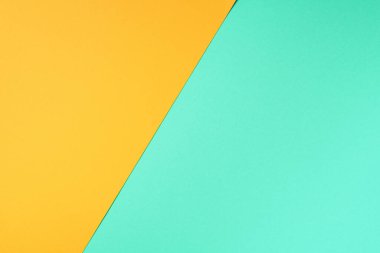 Moda yeşili ve sarı renkli arka plan. Modaya uygun bir kağıt. Üst Manzara. Minimum konsept. Modaya uygun nane rengi