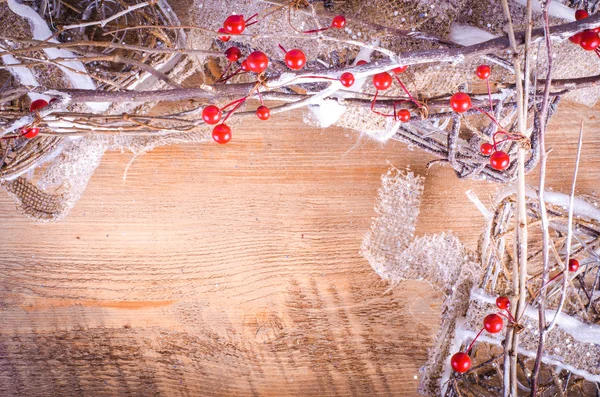 Christmas rustic light boxes on wooden background, snowy wreath, berries. Christmas and New Year decoration frame. Free space for text. — 图库照片