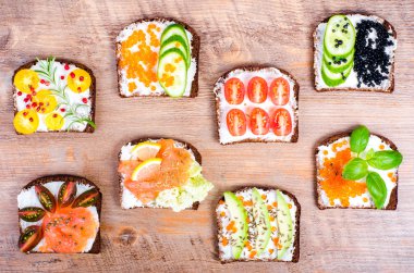 Background of Nordic open sandwiches. Background of scandinavian open sandwiches. Free space for your text.