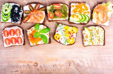 Background of Nordic open sandwiches. Background of scandinavian open sandwiches. Free space for your text.
