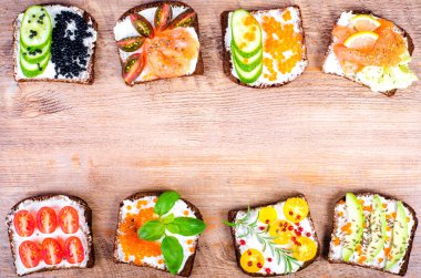 Background of Nordic open sandwiches. Background of scandinavian open sandwiches. Free space for your text.