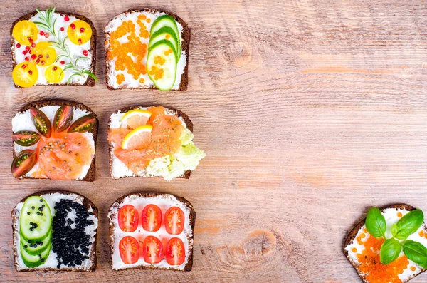 Background of Nordic open sandwiches. Background of scandinavian open sandwiches. Free space for your text.