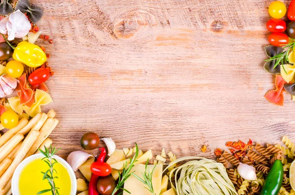 Ingridients for traditional italian dishes on wooden background. Free space for your text — 스톡 사진