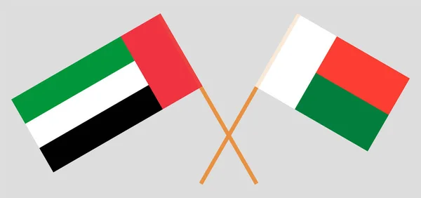 マダガスカルとアラブ首長国連邦の国境を越えた旗 — ストックベクタ