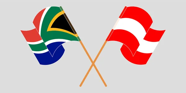 Drapeaux croisés et agités de la République d'Afrique du Sud et de l'Autriche — Image vectorielle