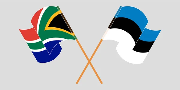 Drapeaux croisés et agités d'Afrique du Sud et d'Estonie — Image vectorielle