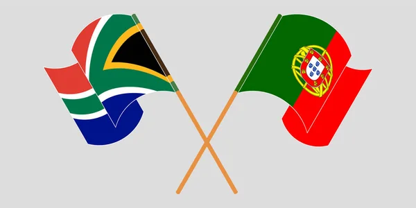 Drapeaux croisés et agités de l'Afrique du Sud et du Portugal — Image vectorielle