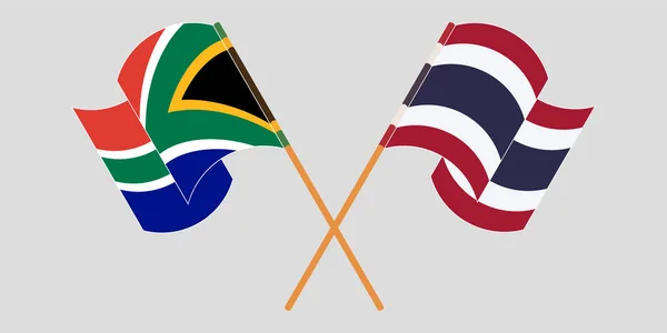 Drapeaux croisés et agités d'Afrique du Sud et de Thaïlande — Image vectorielle