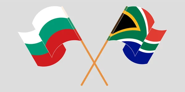 Banderas cruzadas y ondeando de Bulgaria y Sudáfrica — Archivo Imágenes Vectoriales
