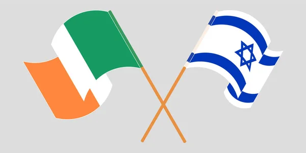 Drapeaux croisés et agités de l'Irlande et d'Israël — Image vectorielle